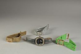 JOAN RIVERS CLASSIC COLLECTION. THREE LADIES WRIST WATCHES AND A GENTLEMAN'S WATCH. (4).
