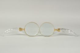 A PAIR OF CUT GLASS HANDLE MAGNIFYING GLASSES.