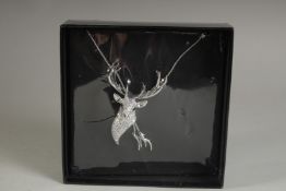 A BUTLER & WILSON DIAMANTE STAG NECKLACE.