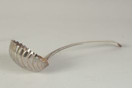 A GEORGE III BRIGHT CUT SILVER SHELL LADLE. London 1767.