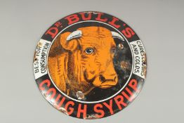 A CIRCULAR TIN SIGN 