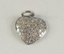 A SMALL DIAMOND ENCRUSTED HEART SHAPED CHARM.