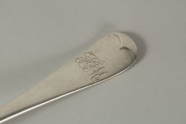 A LONG HANDLED SILVER SERVING SPOON. London 1903. Maker Walker and Hall.