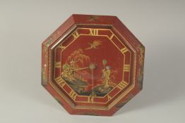 A GOLDSMITH AND SILVERSMITH OCTAGONAL METAL CHINESE DESIGN EASLE CLOCK. 8.5ins .