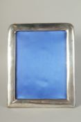 A PLAIN UPRIGHT PHOTOGRAPH FRAME. Birmingham 1934, 9.5ins x 7.5ins.