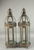 A PAIR OF TALL COPPER LANTERNS 2ft 6ins high.