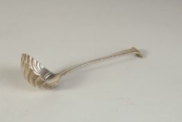A SMALL GEORGE III SILVER SHELL LADLE. London 1770, Maker: T. E.
