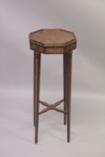 A GEORGIAN MAHOGANY INLAID OCTAGONAL TOP URN STAND with brushing slide on tapering legs with cross