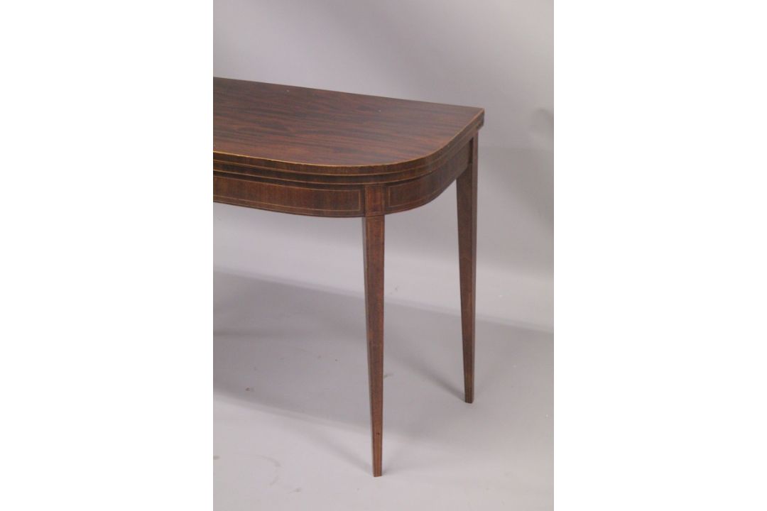 A GEORGIAN MAHOGANY CARD TABLE with folding flap, green baize cover, supported on tapering legs. 3ft - Image 2 of 4