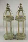 A PAIR OF TALL COPPER LANTERNS 2ft 6ins high.