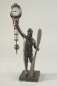 A BRONZE GENTLEMAN AVIATOR MYSTERY CLOCK. 12ins high.