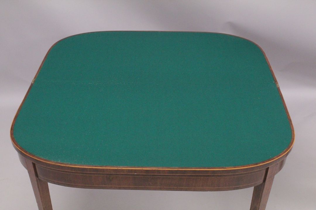 A GEORGIAN MAHOGANY CARD TABLE with folding flap, green baize cover, supported on tapering legs. 3ft - Image 4 of 4