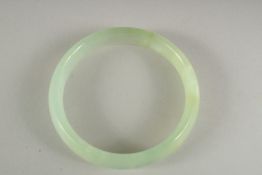 A JADE BANGLE. 2.5ins diameter.