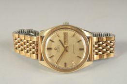 A GENTLEMAN'S OMEGA AUTOMATIC 1950'S DAY DATE WRIST WATCH in a later box.