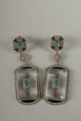 A GOOD PAIR OF DECO STYLE DAIMOND , EMERALD AND CRYSTAL DROP EARRINGS.