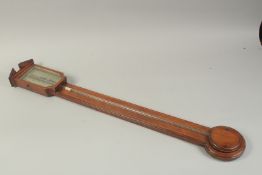 A GEORGE III MAHOGANY STICK BAROMETER by POCHAINE 37ins long.