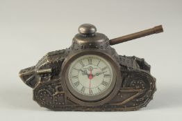 A NOVELTY BRONZE CLOCK MODELLED AS A TANK. 6ins long.