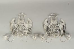 A VERY LONG PAIR OF SILVER PLATED BAT WINGS WALL SCONCES each with two scrolling branches.