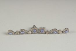 A PAIR OF DIAMOND AND SAPPHIRE DROP EARRINGS.