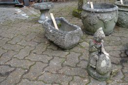 A reconstituted stone garden ornament, a planter and a small bird bath.