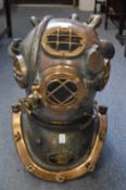 A good period divers helmet manufactured by The Diving Equipment and Salvage Company Incorporated,