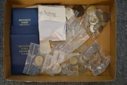 A quantity of pre-decimal and other coins.