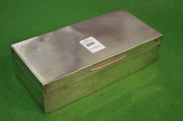 A silver table cigarette box, front engraved with armorial The Buffs and engraved with signatures.