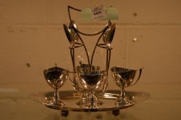 A plated egg cruet.