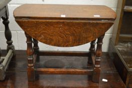 A small oak drop-leaf table.