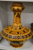 An Islamic Moorish slip glazed pottery pedestal vase.