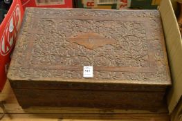 An Indian carved wood box.