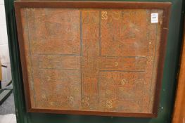 An Islamic textile, framed and glazed.