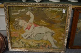 A Victorian wool work picture of a reclining girl in a woodland setting.