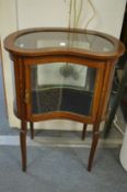 An Edwardian inlaid mahogany kidney shaped table vitrine.