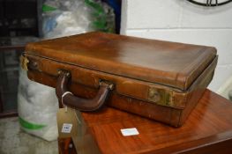 A leather attache case.
