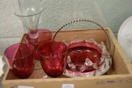 An early drinking glass with baluster shaped stem, three cranberry wine glasses and a cranberry dish