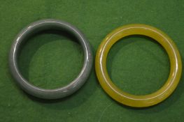 Two jade bangles.