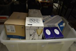 A quantity of boxed glassware.