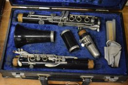 A Boosey and Hawkes cased clarinet.