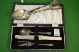 Two Georgian silver serving spoons and a cased silver Christening set.