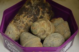 A group of excavated ammunition shell heads.