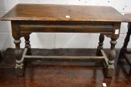 An oak occasional table.