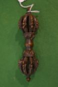 A Tibetan bronze Vajra.
