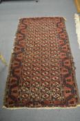 A Tekke rug 173cm x 93cm.