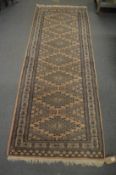 A modern Persian design runner 212cm x 80cm.