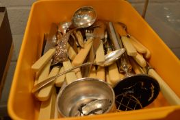 A quantity of flatware and plated items.