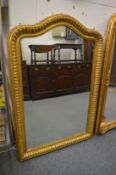 A good 19th century arched topped gilt framed wall mirror.