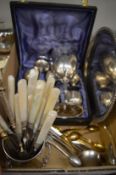 Plated items to include a salver, goblet, mother of pearl handled dessert knives and forks etc.