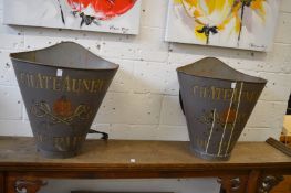 A pair of grape picking buckets.