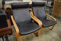 A pair of stylish armchairs.